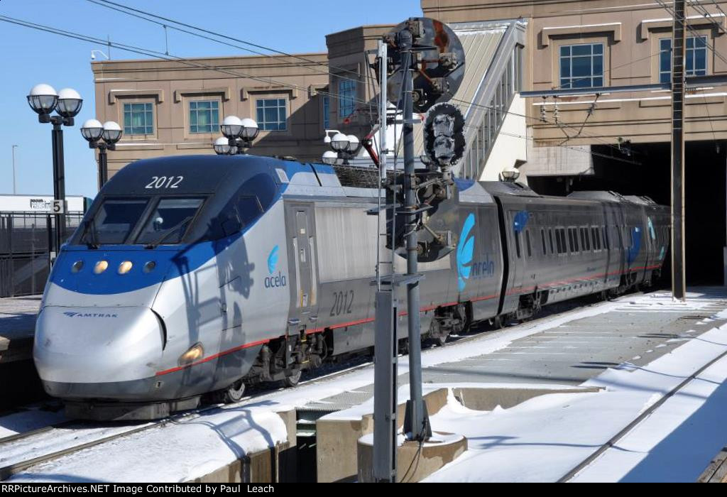 Westbound Acela Express comes though the station